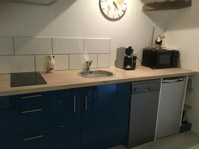 Cuisine ou kitchenette dans l'établissement Arlequin