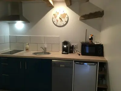 Cuisine ou kitchenette dans l'établissement Arlequin