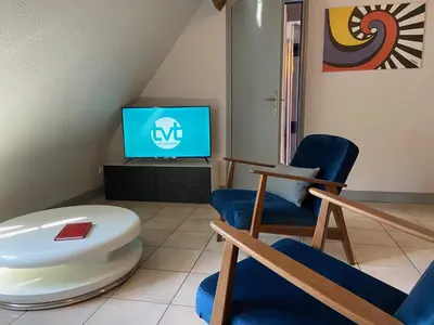 Télévision ou salle de divertissement dans l'établissement Le 38, gite 2 chambres proche commerces