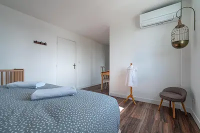 Un ou plusieurs lits dans un hébergement de l'établissement L'Auberge du Croissant