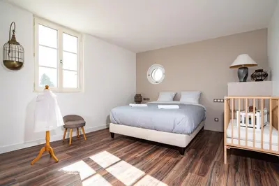 Un ou plusieurs lits dans un hébergement de l'établissement L'Auberge du Croissant