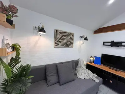 Coin salon dans l'établissement Cottage cosy avec spa privatif - escapade romantique Val de Loire