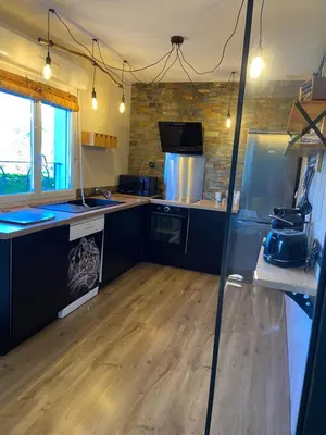 Cuisine ou kitchenette dans l'établissement Les logis du forgeron-Gites avec piscine près d'Angers