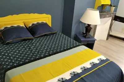 Un ou plusieurs lits dans un hébergement de l'établissement Le gîte de Georgette