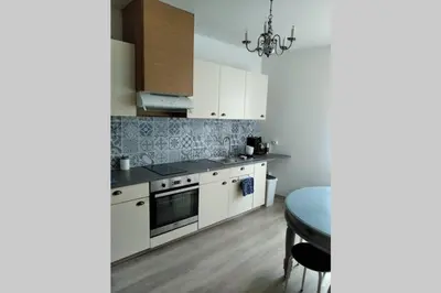 Cuisine ou kitchenette dans l'établissement Le gîte de Georgette