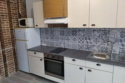 Cuisine ou kitchenette dans l'établissement Le gîte de Georgette
