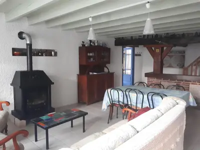 Coin salon dans l'établissement Grand gîte à la campagne