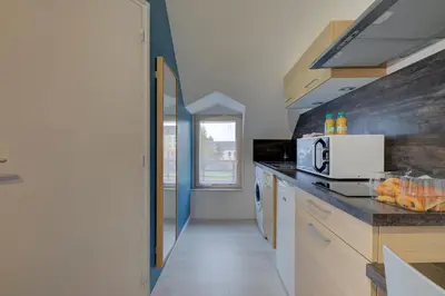Cuisine ou kitchenette dans l'établissement La petite maison 3