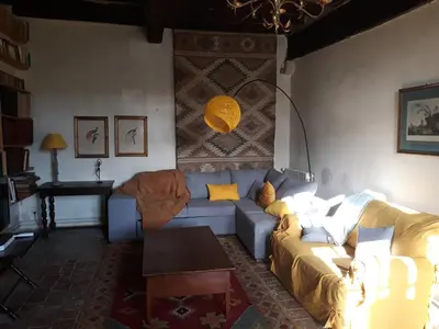Coin salon dans l'établissement Le Castel