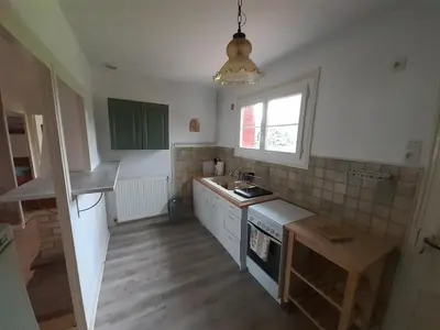 Cuisine ou kitchenette dans l'établissement Le Beau Val