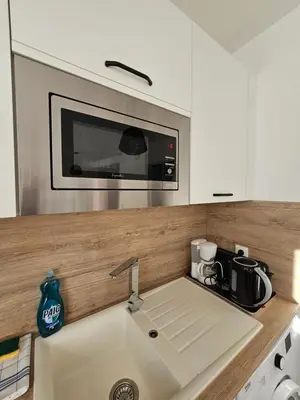 Cuisine ou kitchenette dans l'établissement Dolmen Adrien 3