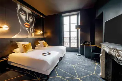 Un ou plusieurs lits dans un hébergement de l'établissement Hotel Leprince, Best Western Premier Collection