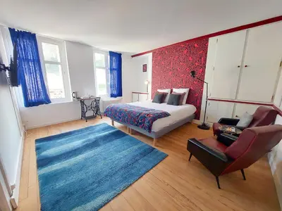Un ou plusieurs lits dans un hébergement de l'établissement Le Huis Clos