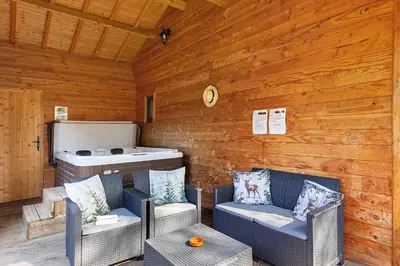 Coin salon dans l'établissement Gîte Nature et Spa - Oisly
