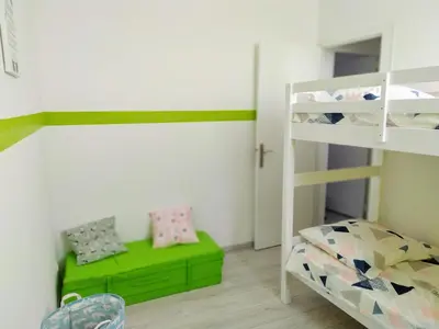 Un ou plusieurs lits dans un hébergement de l'établissement Casa Louka