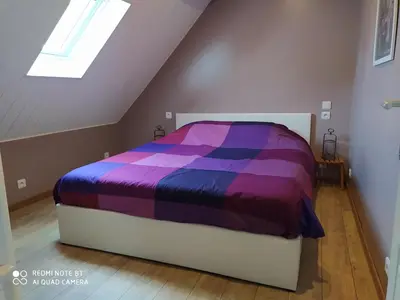 Un ou plusieurs lits dans un hébergement de l'établissement Gîte L'atelier