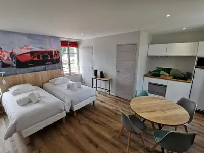 Cuisine ou kitchenette dans l'établissement Malicorn' Appart-Hôtel