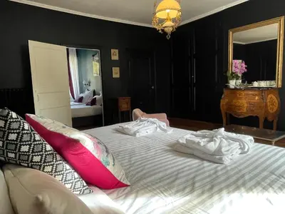Un ou plusieurs lits dans un hébergement de l'établissement Maison Clairbois
