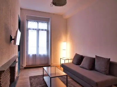 Coin salon dans l'établissement Appartement hypercentre au 1er, ZOO - 24h du Mans