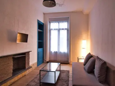 Coin salon dans l'établissement Appartement hypercentre au 1er, ZOO - 24h du Mans