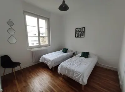 Un ou plusieurs lits dans un hébergement de l'établissement Appartement 1-6 pers situé entre les ponts