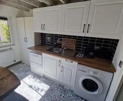 Cuisine ou kitchenette dans l'établissement 