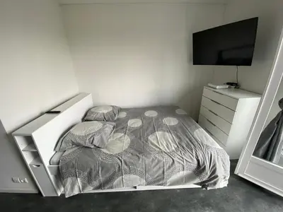 Un ou plusieurs lits dans un hébergement de l'établissement Appartement du Val de Loire