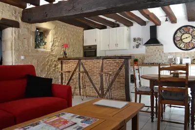 Coin salon dans l'établissement Le Pigeonnier, maison de charme au pied du château