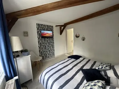 Un ou plusieurs lits dans un hébergement de l'établissement 2 chambres, 4 a 6 voyageurs en centre ville, à 5 mins du zoo