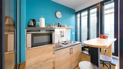 Cuisine ou kitchenette dans l'établissement L'Atelier Corval