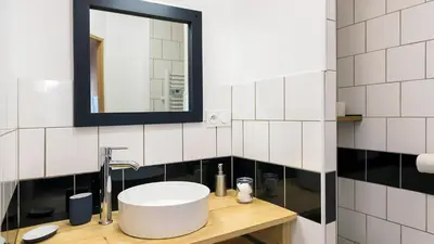 Salle de bains dans l'établissement L'Atelier velours