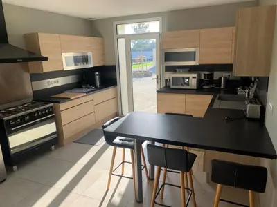 Cuisine ou kitchenette dans l'établissement La Chambrisienne-Mr et Me Chambris