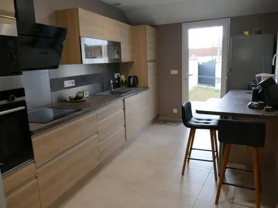 Cuisine ou kitchenette dans l'établissement La Chambrisienne-Mr et Me Chambris