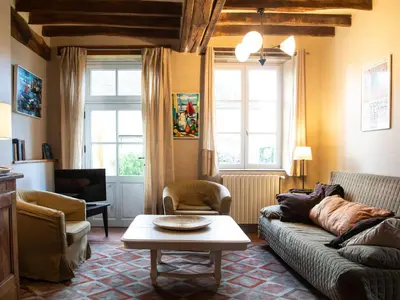 Coin salon dans l'établissement Gîte paisible pour 6 pers. près du zoo de la Flèche, avec jardin, barbecue et WiFi - FR-1-410-126
