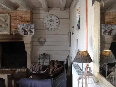 Coin salon dans l'établissement Maison de campagne bucolique près du Mans - FR-1-410-203