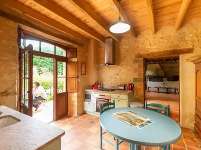 Un ou plusieurs lits dans un hébergement de l'établissement Charme et authenticité : gîte pour 4 pers. en bord de rivière avec jardin enchanteur en Sarthe - FR-1-410-236