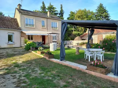 Jardin de l'établissement Maison confortable avec jardin, proche centre-ville et circuit 24h du Mans - FR-1-410-271