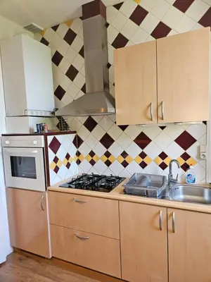 Cuisine ou kitchenette dans l'établissement Appart T2 Quartier Beaujardin