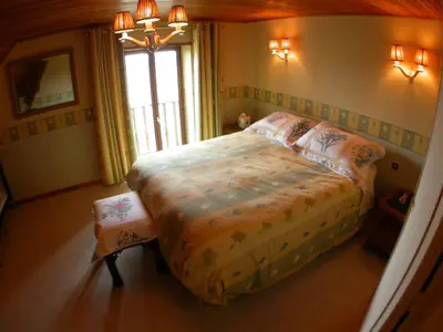 Un ou plusieurs lits dans un hébergement de l'établissement Camping Au Clos de Beaulieu