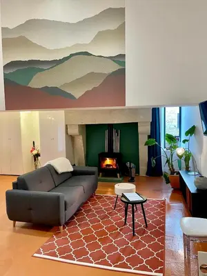 Coin salon dans l'établissement La Maison BellecOur