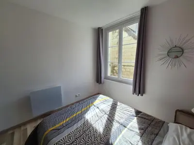 Un ou plusieurs lits dans un hébergement de l'établissement Bel appartement 50m2 en plein centre de Saumur