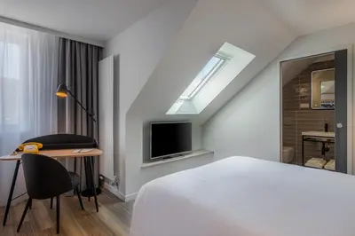 Télévision ou salle de divertissement dans l'établissement Ferdinand Hotel Tours