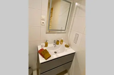 Salle de bains dans l'établissement Cocon de Douceur : Apaisement et Harmonie intérieure