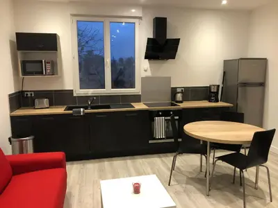 Cuisine ou kitchenette dans l'établissement La Grange Lucien