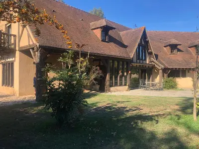 Jardin de l'établissement Évasion champêtre : Maison avec piscine, tennis, et étang au cœur de 50 hectares de forêt - FR-1-410-307