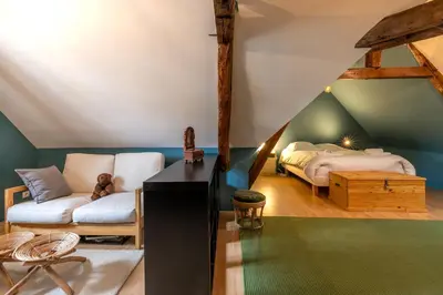 Un ou plusieurs lits dans un hébergement de l'établissement Chez Miriam - Maison de caractère - Ville avec jardin