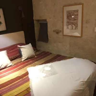 Un ou plusieurs lits dans un hébergement de l'établissement TROGLODYTE LOFT 2