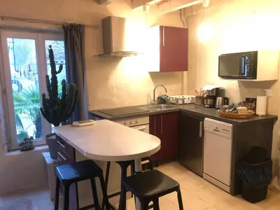 Cuisine ou kitchenette dans l'établissement TROGLODYTE LOFT 2
