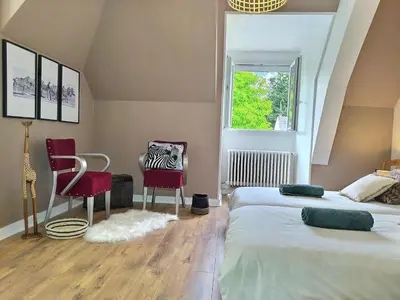 Un ou plusieurs lits dans un hébergement de l'établissement Chambre d'hôtes de Verdigné Piscine chauffée Parking Wifi