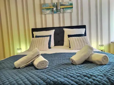 Un ou plusieurs lits dans un hébergement de l'établissement Chambre d'hôtes de Verdigné Piscine chauffée Parking Wifi